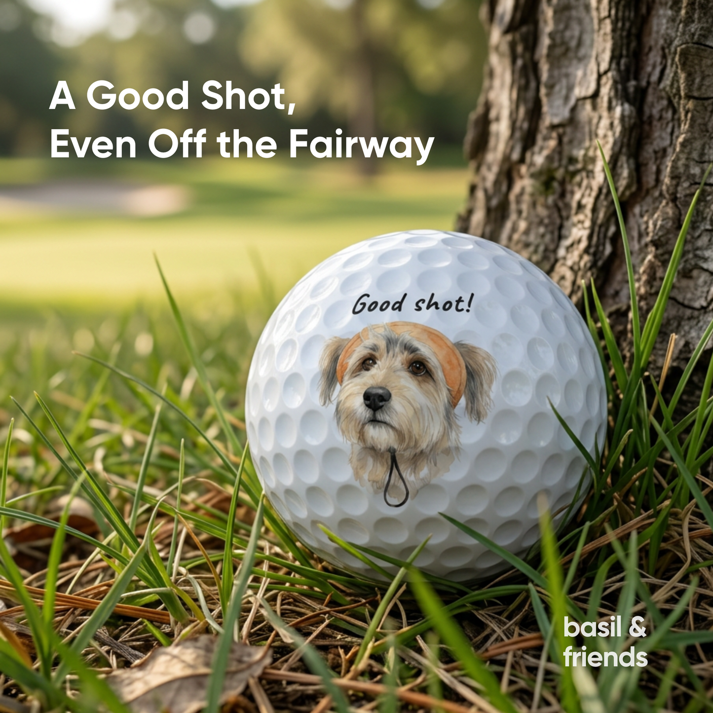 Custom dog golf ball lying in the rough grass next to a tree, showing the durable print quality for actual play on the golf course.