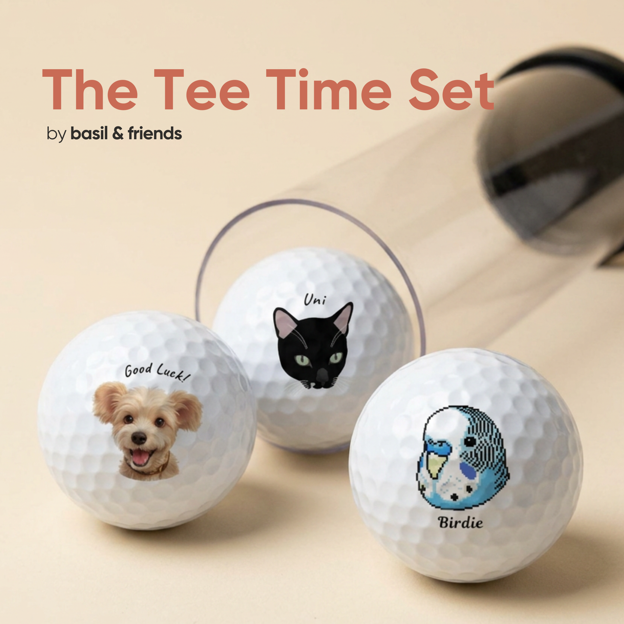 The Tee Time Set of 3 custom pet golf balls in packaging, featuring a dog, a black cat, and a parrot, showing you can print different pets on each ball.